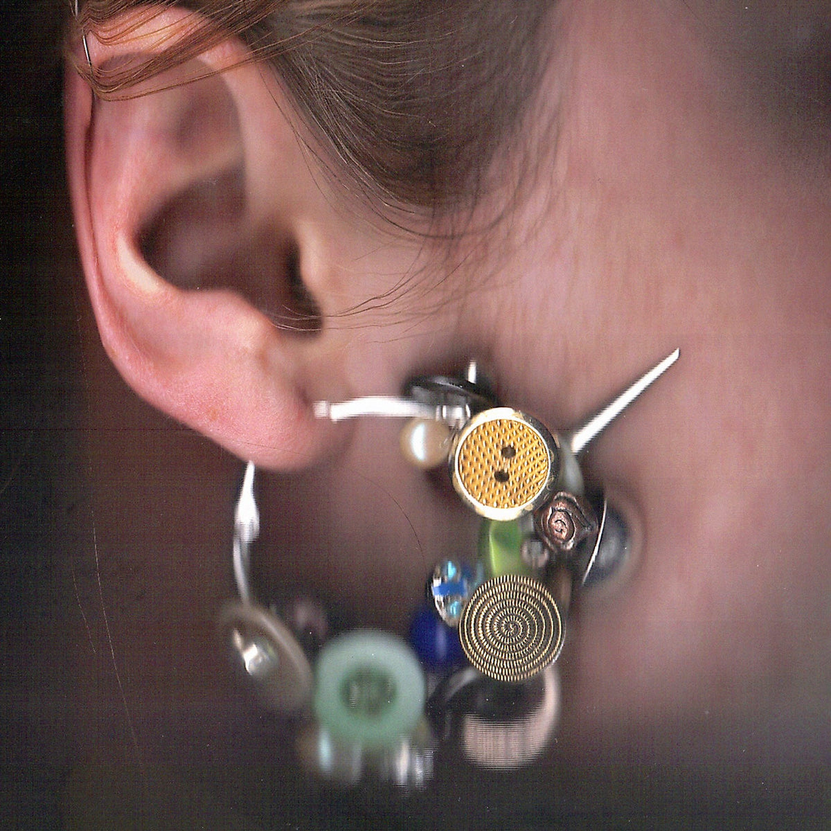 Button earrings - The Forumist