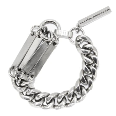 A polished stainless steel bracelet with a curb chain link design and a linear plate embellishment, featuring a signature MPS clasp.
