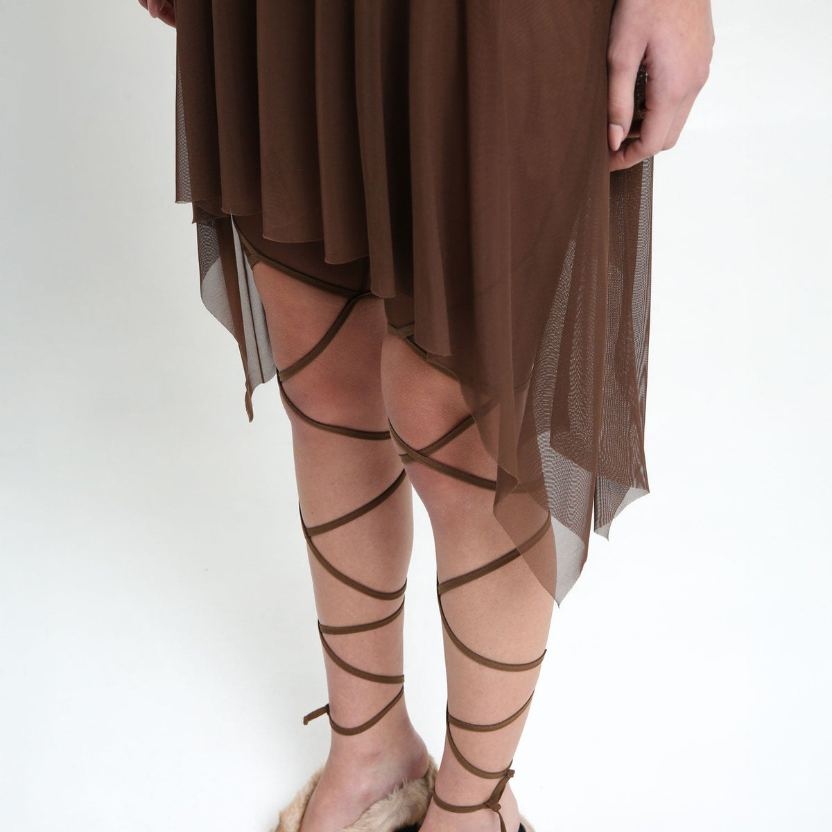 Brown tie up mesh skorts with cut outs - The Forumist