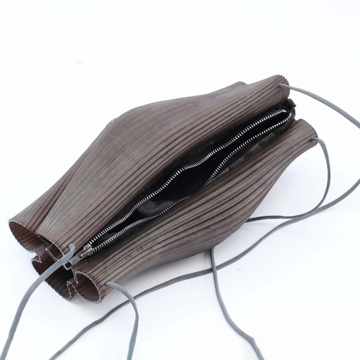 Rubber Sling Bag - The Forumist